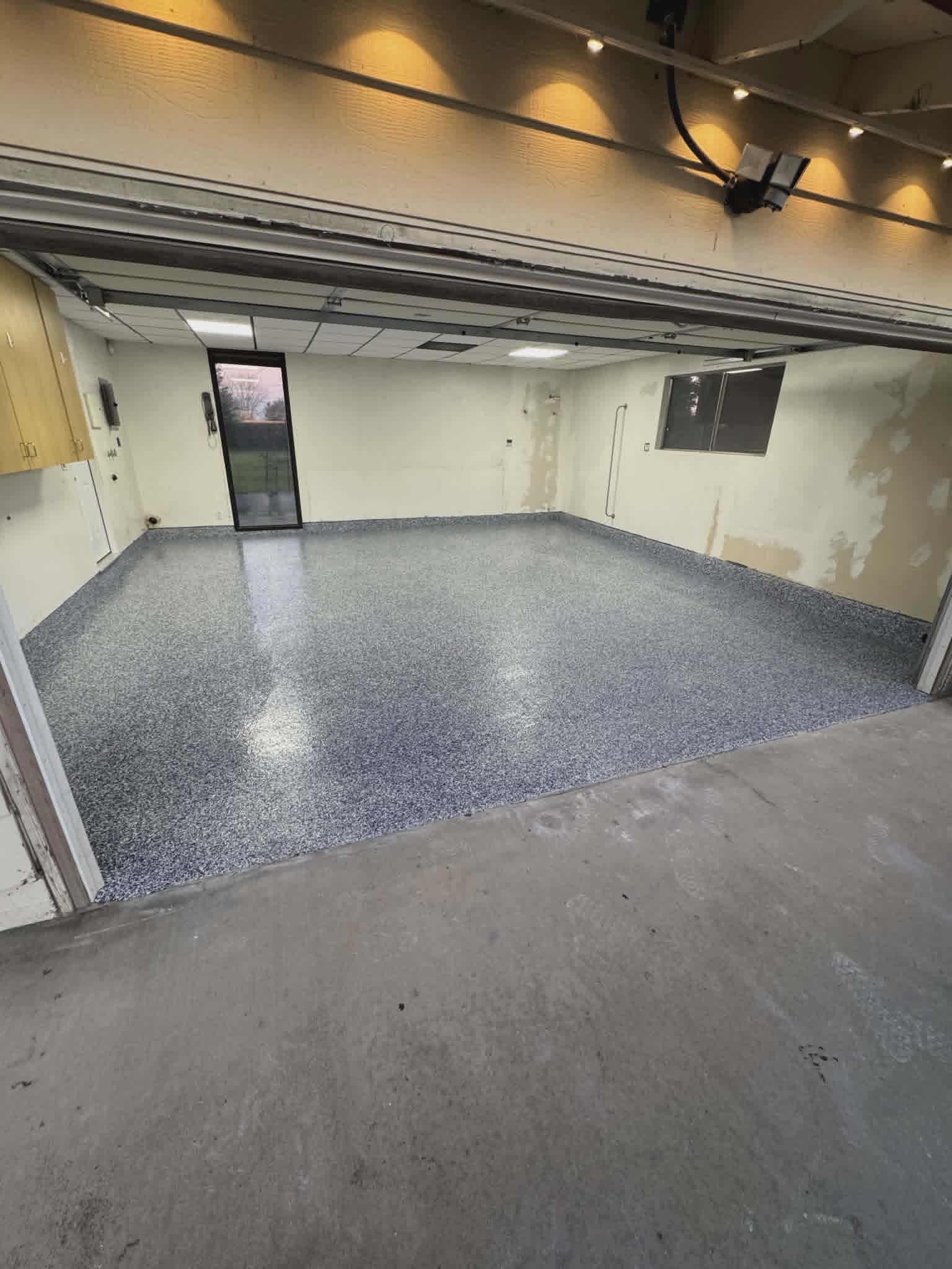 Blue flake epoxy garage floor coating, wide view